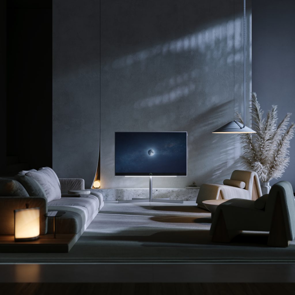 LOEWE Stellar Alu Concrete mit Mondmotiv in einem modernem Wohnzimmer bei Nacht